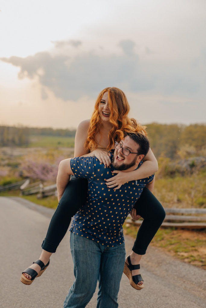 person holding their partner on their back