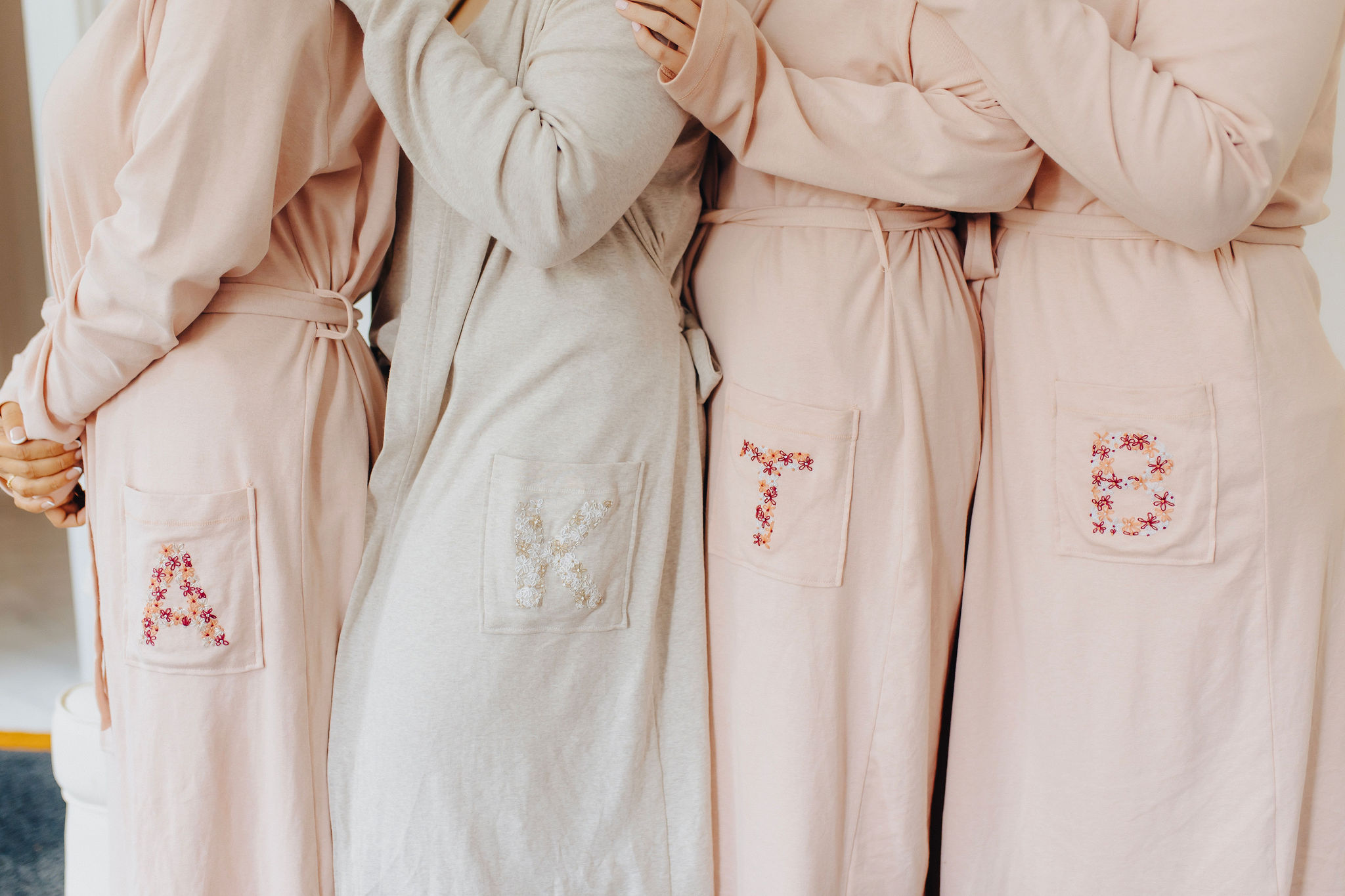 matching robes with initials on them