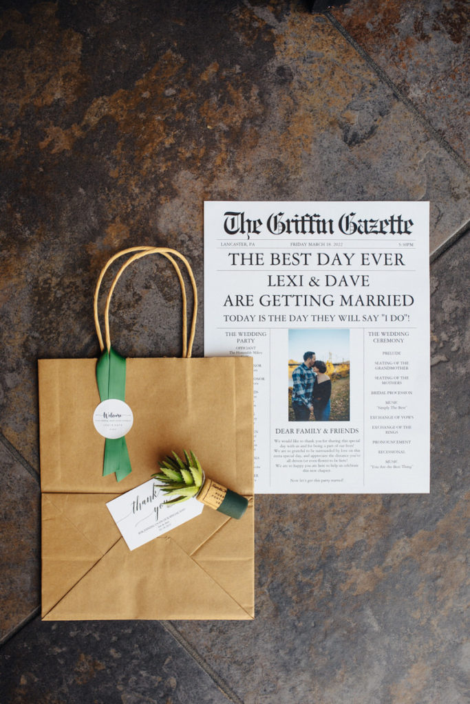 newspaper mockup announcing wedding with a brown paper bag on top
