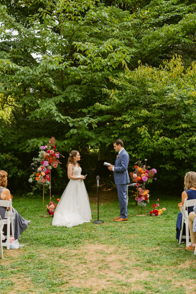 A couple sharing their vows during their wedding ceremony